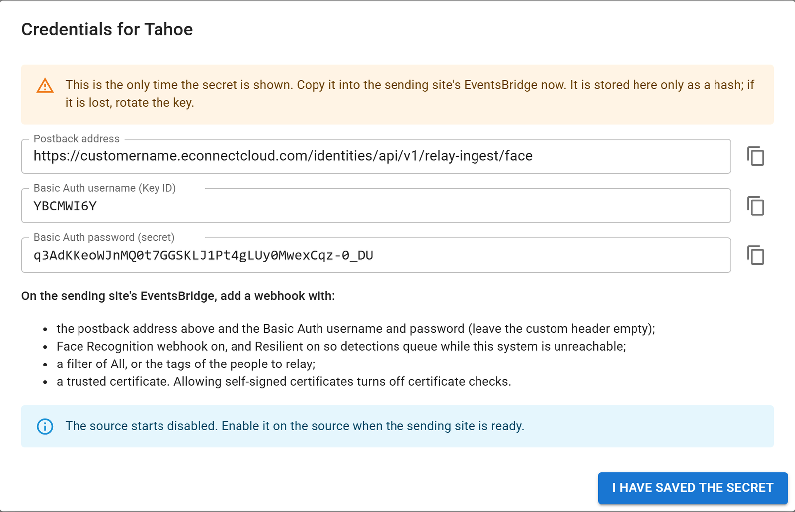 The receiver's one-time credentials dialog: postback address, Key ID and secret